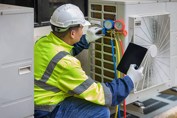 Professional Hvac technician working in Tappahannock, VA